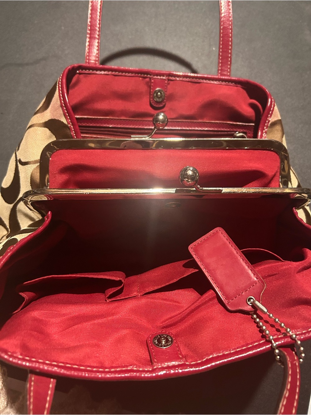 Coach Brown Signature Canvas Shoulder Bag with Red Interior
